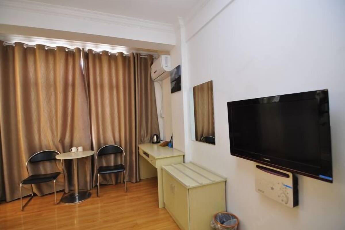 Relax in this cozy space with a flat-screen TV, microwave, and coffee maker.