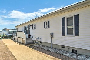 Exterior - Fire Pit + Views: Canal-Front Fenwick Island Home (Selbyville)