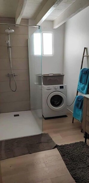 Shower, hair dryer, towels, soap
