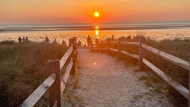 A beach path leading to the ocean with people walking and sitting along the shore. - NEW LISTING!!!  Villas Quaint Coastal Cottage short drive to Beaches (Lower Township)