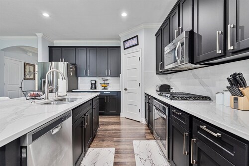 Cozy 4 bedroom 3.5 bath home located in the heart of Little Elm. 