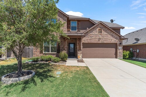 Cozy 4 bedroom 3.5 bath home located in the heart of Little Elm. 