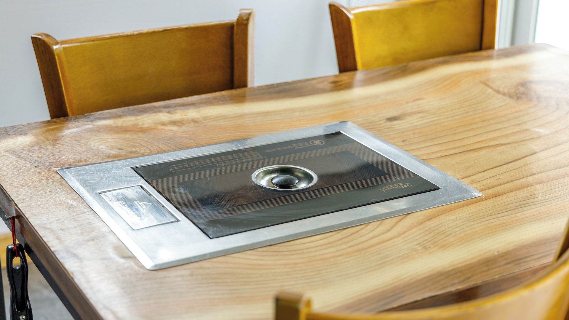 A table with a built-in air conditioning unit.