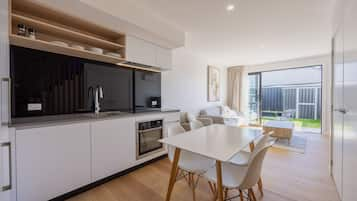 Three Bedroom Apartment | Private kitchen | Dining tables