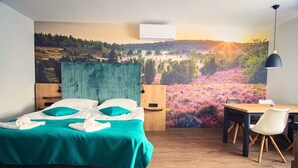 A bedroom with a bed, a desk, and a chair. - Olimje Apartment with Private Sauna & Free Outdoor Pool - Gobi (Šmarje pri Jelšah)