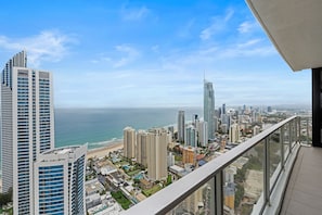 Enjoy unobstructed views of the city and ocean from this hotel's glass facade.