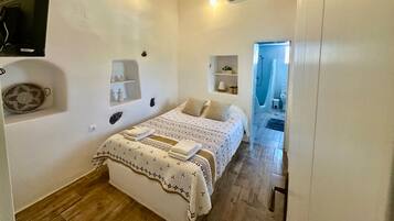 2 dormitorios, tabla de planchar con plancha, wifi gratis y ropa de cama