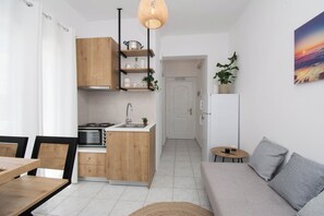 Appartement Confort | Espace de travail pour ordinateur portable, Wi-Fi gratuit, draps fournis