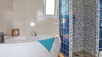 Cottage | Bathroom | Separate tub and shower, deep soaking tub, hair dryer, towels