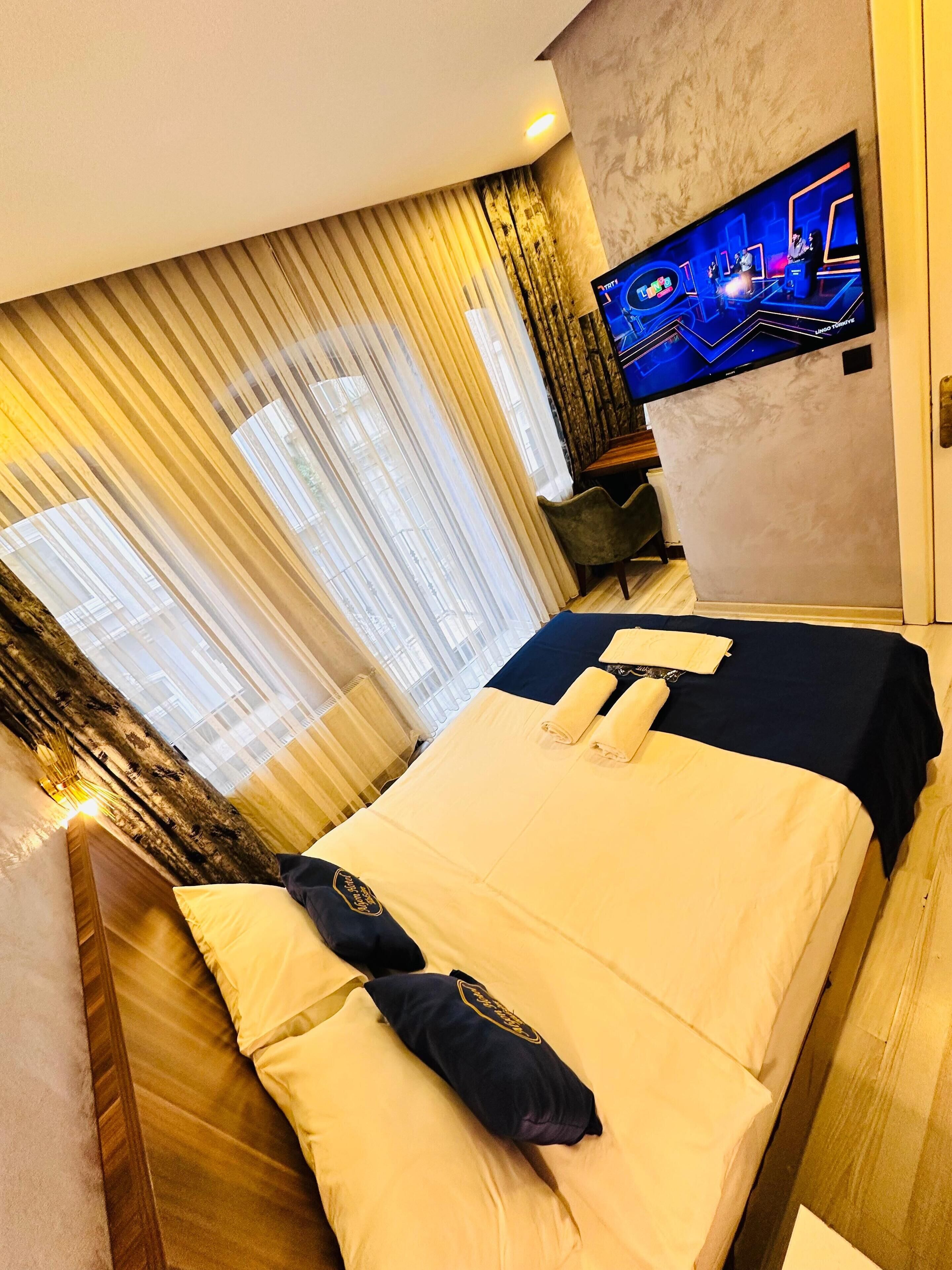 Superior Studio Suite, City View | Premium bedding, minibar, desk, blackout drapes