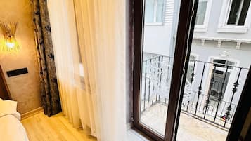 Superior Studio Suite, City View | Premium bedding, minibar, desk, blackout drapes