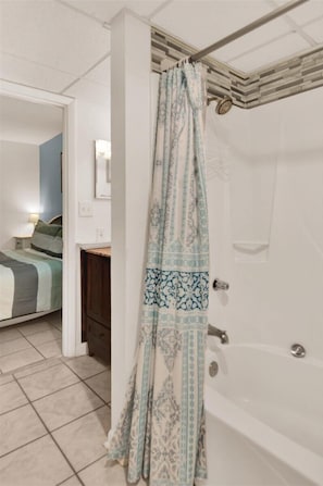 Bathtub, hair dryer, towels