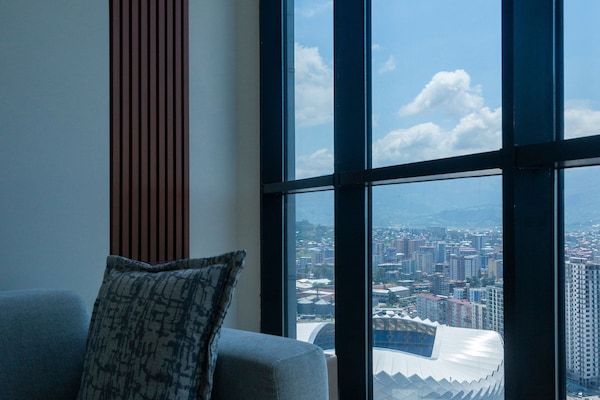 Family Suite | Living area | 42-inch Smart TV with satellite channels, TV