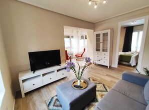 2 dormitorios, tabla de planchar con plancha, cuna de viaje y wifi