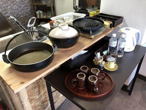 Full-size fridge, microwave, stovetop, rice cooker