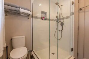Shower, towels, soap, toilet paper
