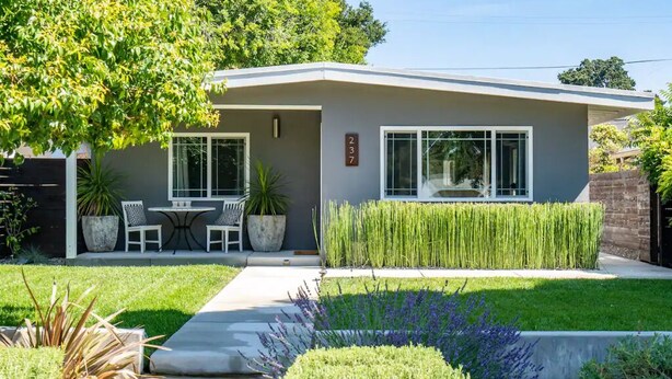A modern two-story house with a patio, a number '237' sign, and a well-maintained garden. - Close to Downtown! Gorgeous MidCentury w/fire pit (Paso Robles)