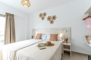 Minibar, in-room safe, iron/ironing board (on request), free WiFi - Hostal Rosell Boutique (Sant Antoni de Portmany)