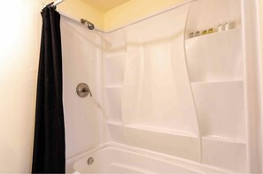 Combined shower/tub, hair dryer, towels, shampoo