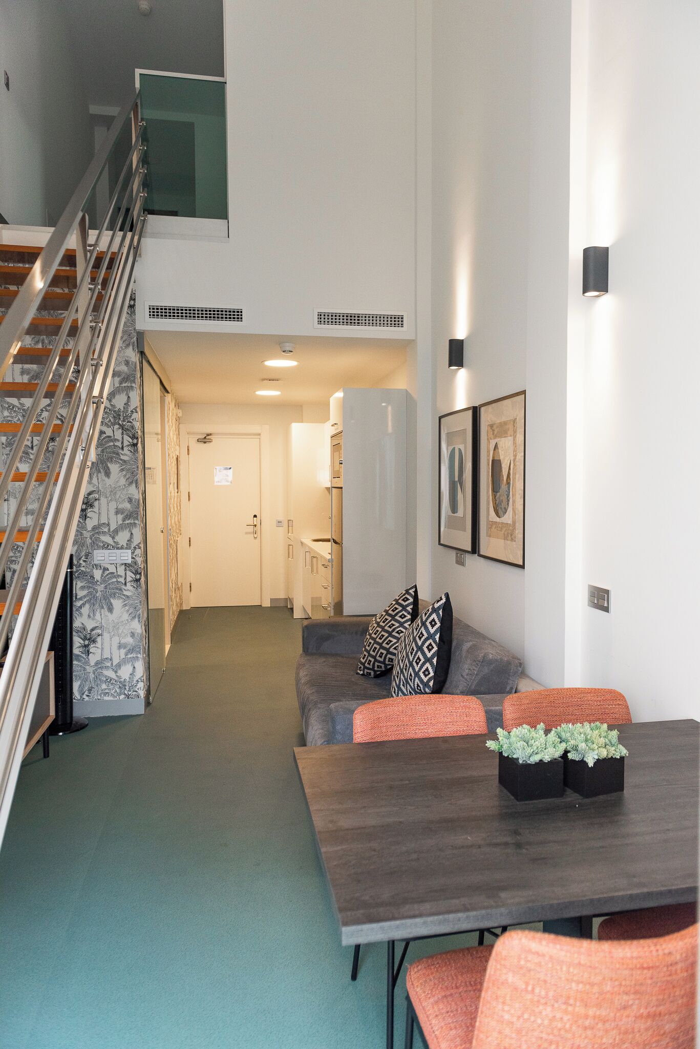 City Quadruple Room | Living area | 50-inch Smart TV with cable channels, TV