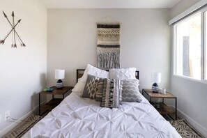 4 bedrooms, desk, iron/ironing board, travel cot