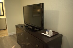 Habitación individual ejecutiva | Tabla de planchar con plancha, wifi gratis, ropa de cama