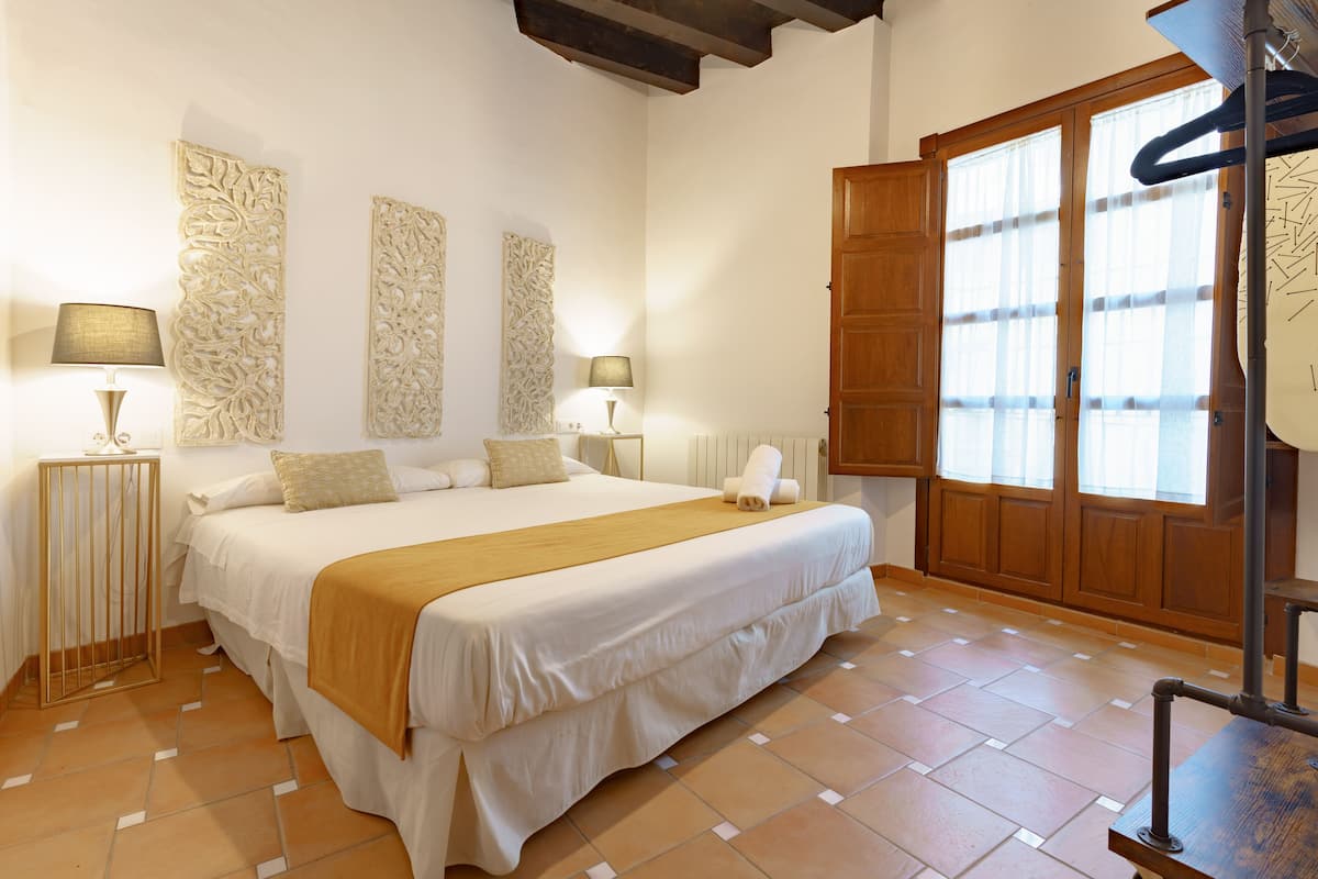Apartment, 1 Bedroom | 1 bedroom, laptop workspace, soundproofing, iron/ironing board