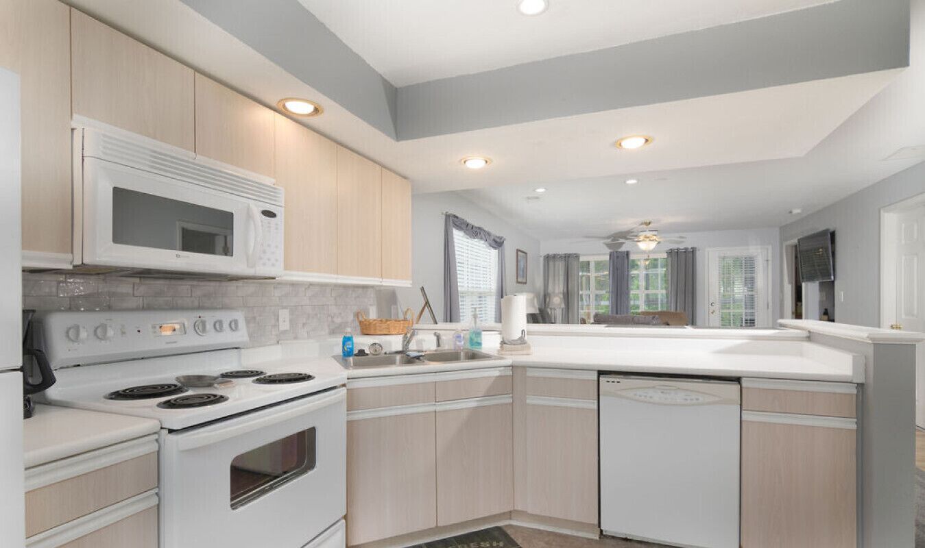 Fridge, coffee/tea maker, cookware/dishes/utensils