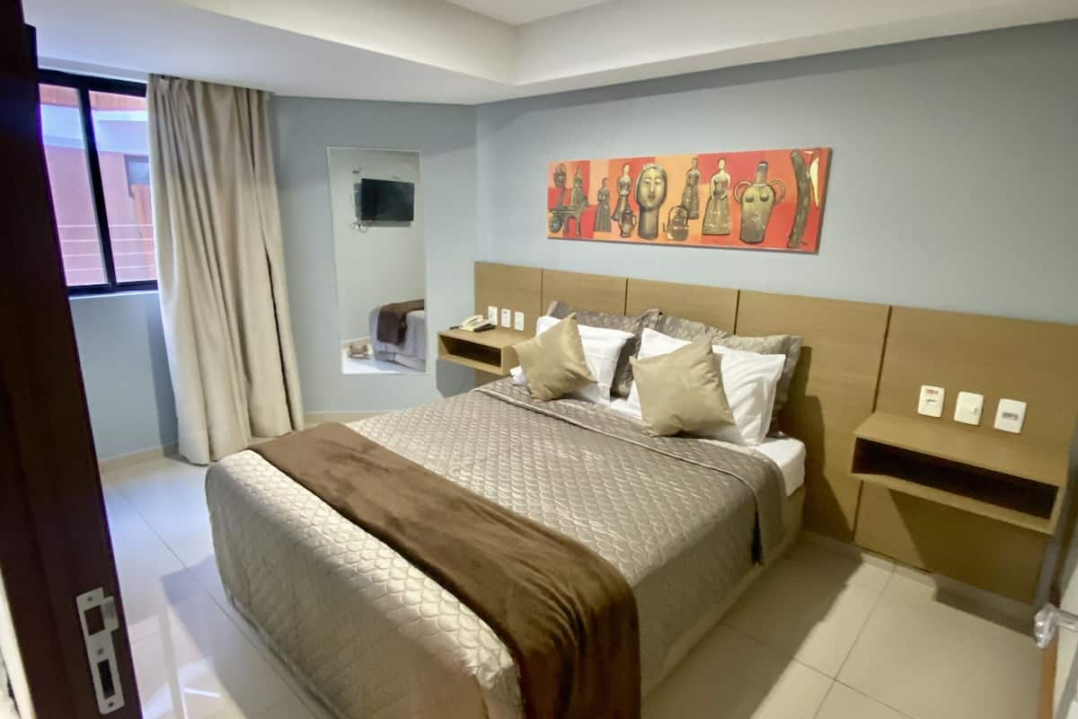 Premium Room | 1 bedroom, premium bedding, minibar, individually decorated