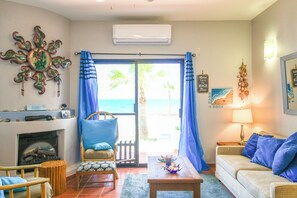 TV, fireplace - Paradise Villas #16: Playa Encanto beachfront w/ ocean views and pool access (Puerto Peñasco)