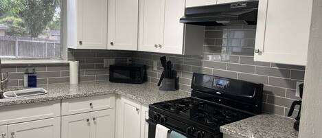 Microwave, oven, stovetop, coffee/tea maker