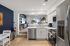 Coffee/tea maker, fridge, microwave, oven