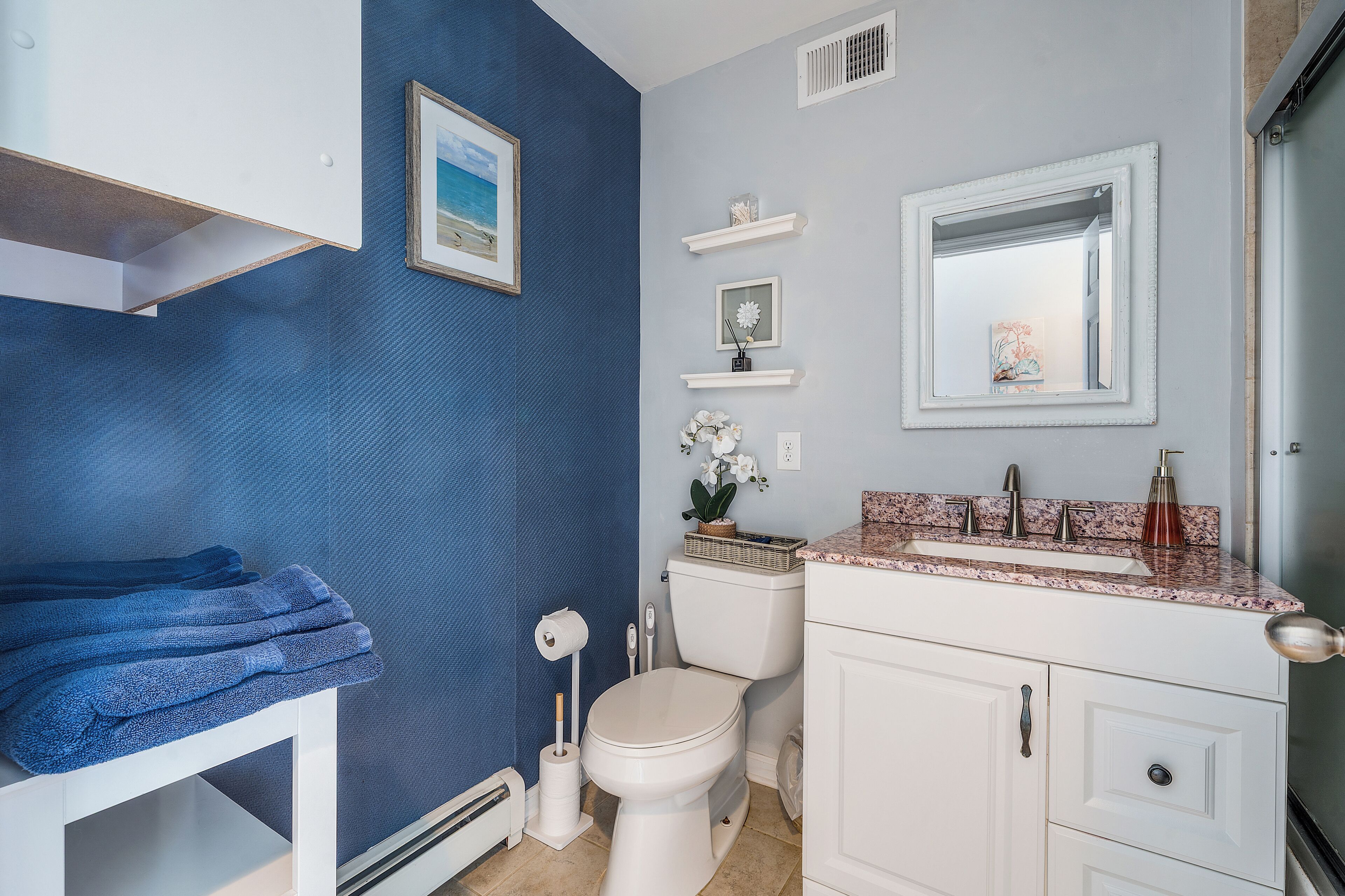 Combined shower/bathtub, hair dryer, towels, soap