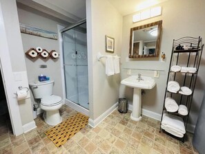 Shower, hair dryer, towels, soap
