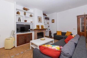 Televisie en een open haard