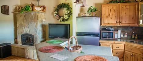 Fridge, microwave, stovetop, coffee/tea maker