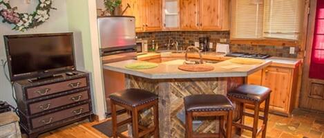 Fridge, microwave, stovetop, coffee/tea maker