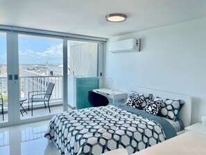 1 bedroom, desk, iron/ironing board, travel crib