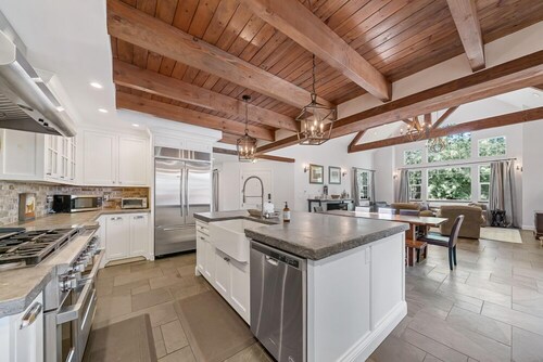 5 BR  5 BA W/ FENCED BACK YARD STEPS AWAY FROM THE ARNOLD RIM TRAIL