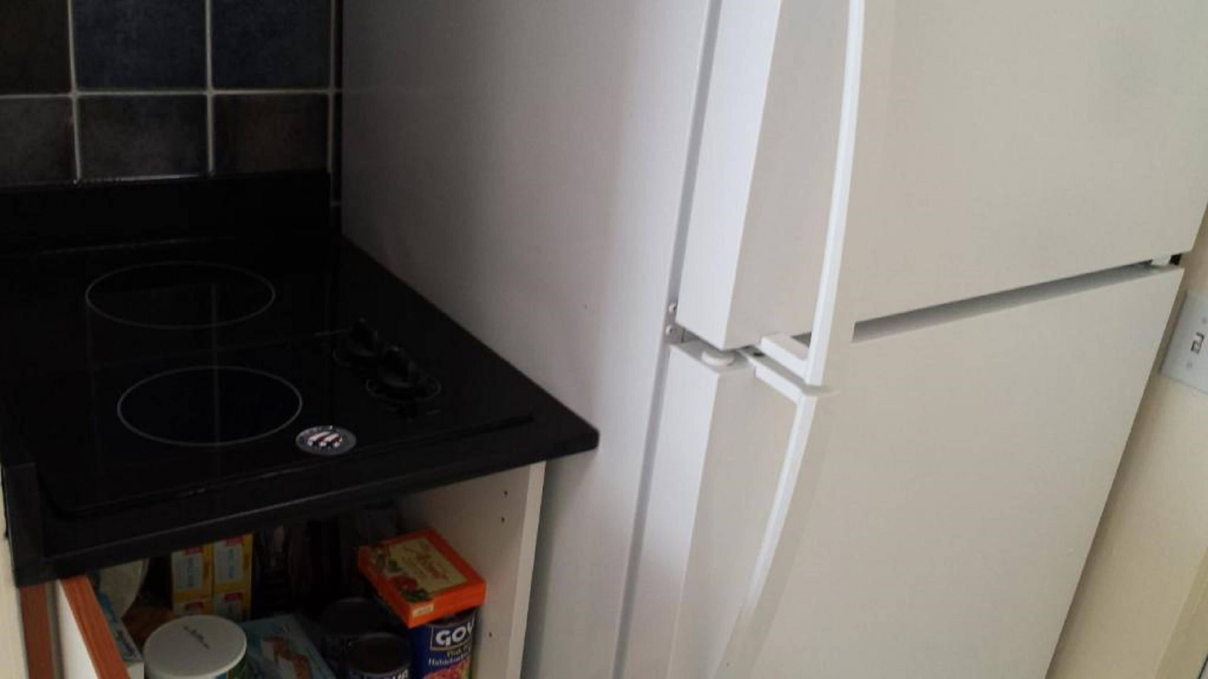 superior studio suite | private kitchenette | full-sized fridge, microwave, stovetop, toaster