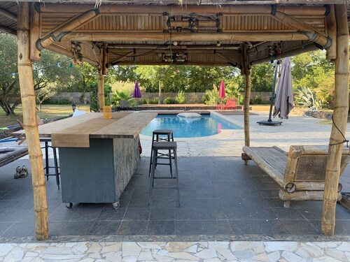 Villa with swimming pool in a natural area