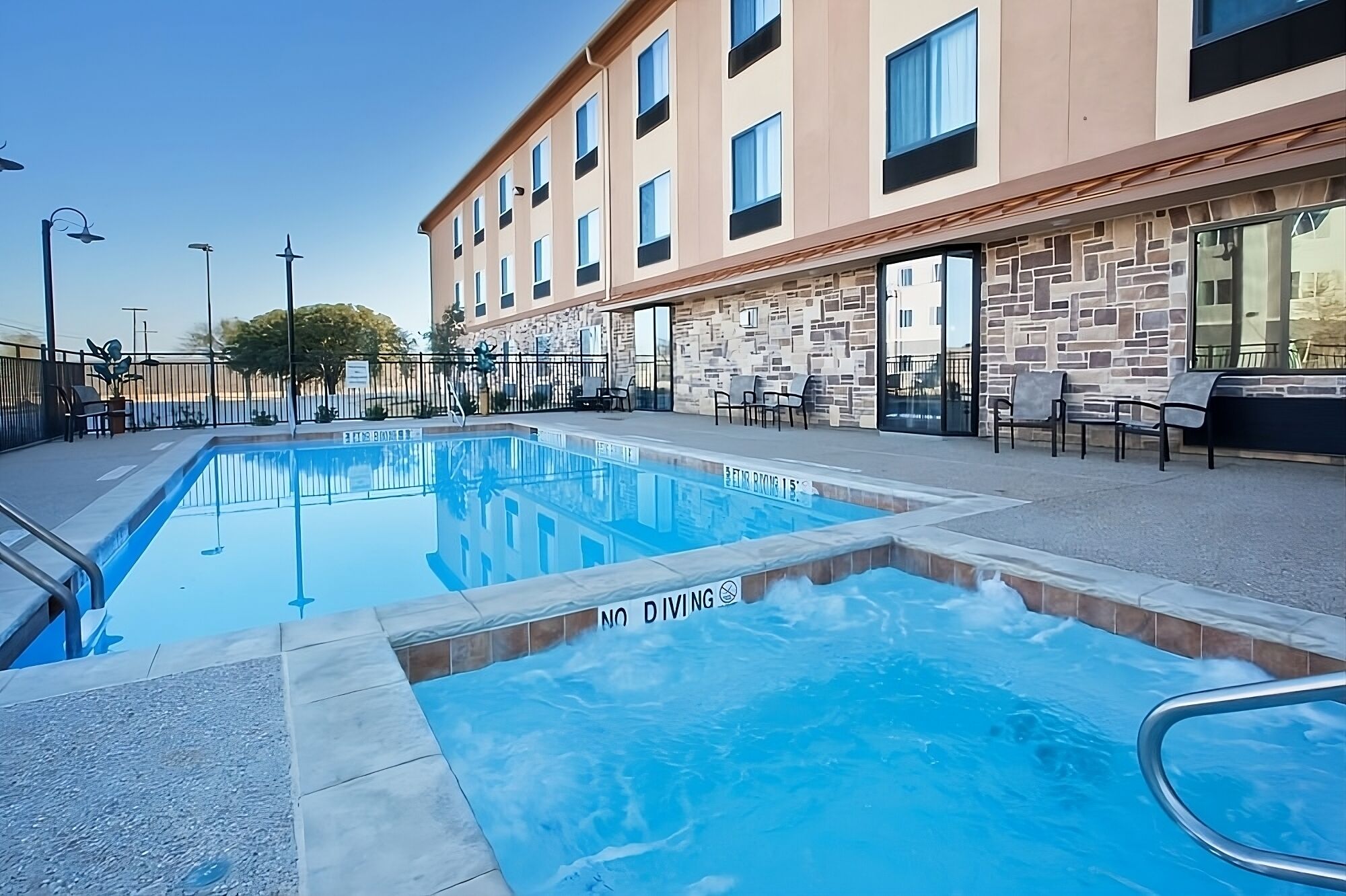 Comfort Meets Affordability at Red Lion Inn & Suites Mineral Wells! Onsite Pool!