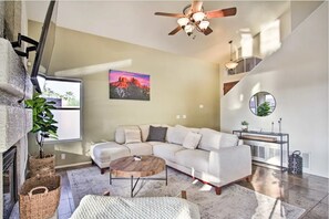 Smart TV, fireplace, books, offices