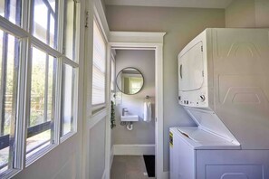 Bathtub, eco-friendly toiletries, hair dryer