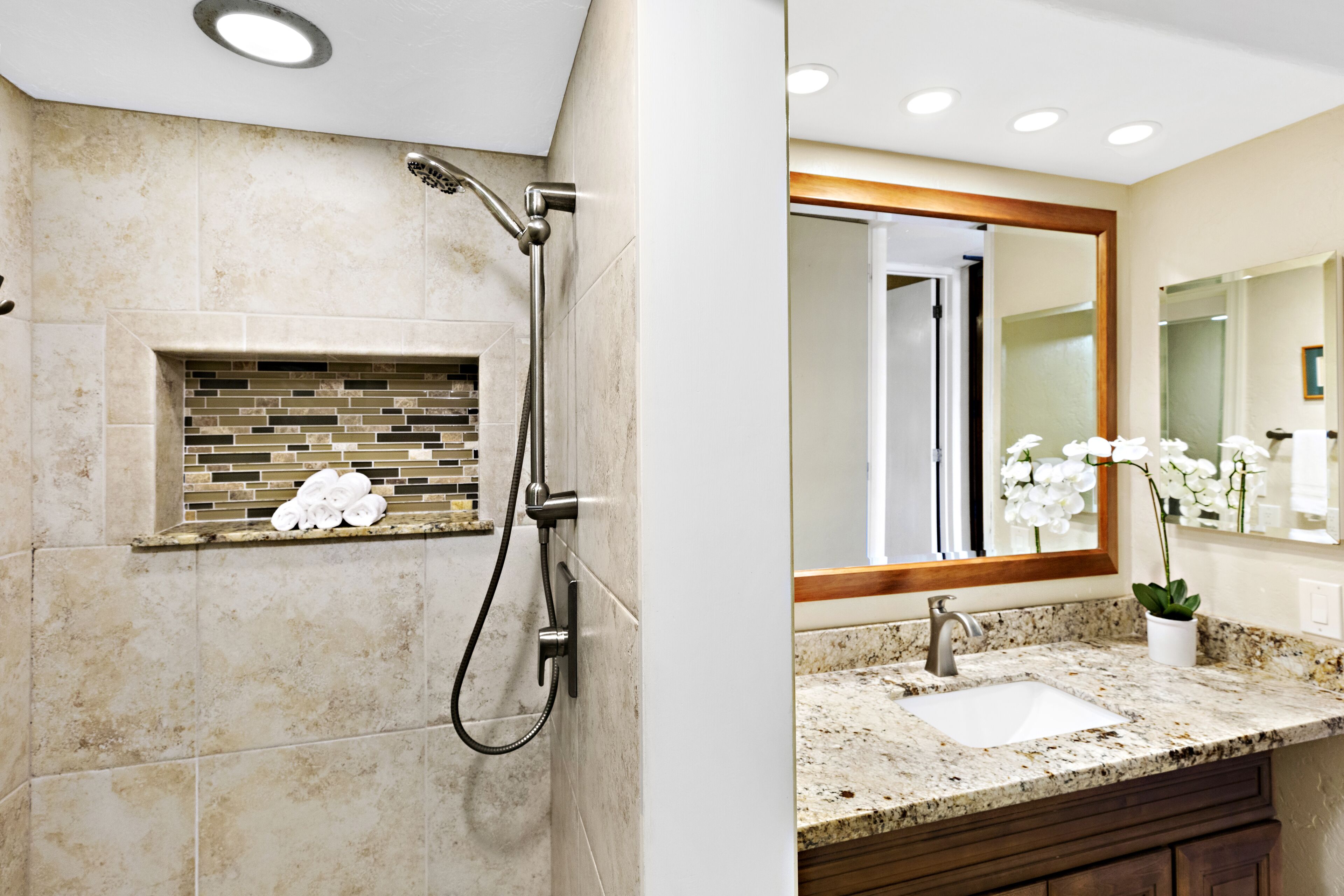 Shower, hair dryer, towels, shampoo