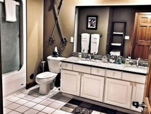 Bathtub, jetted tub, towels, soap