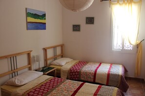 4 bedrooms, iron/ironing board, travel cot, bed sheets