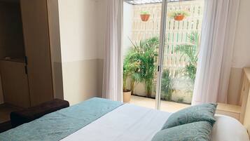 Suite estudio Confort (Jacaranda) | 1 habitación, edredón, camas Select Comfort y decoración personalizada