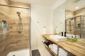 Light & Airy Mountain Town Apartment | Bathroom | Shower, hair dryer, towels, soap