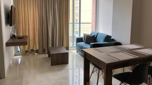 Apartment, 1 Bedroom, 2 Single Beds | Living area